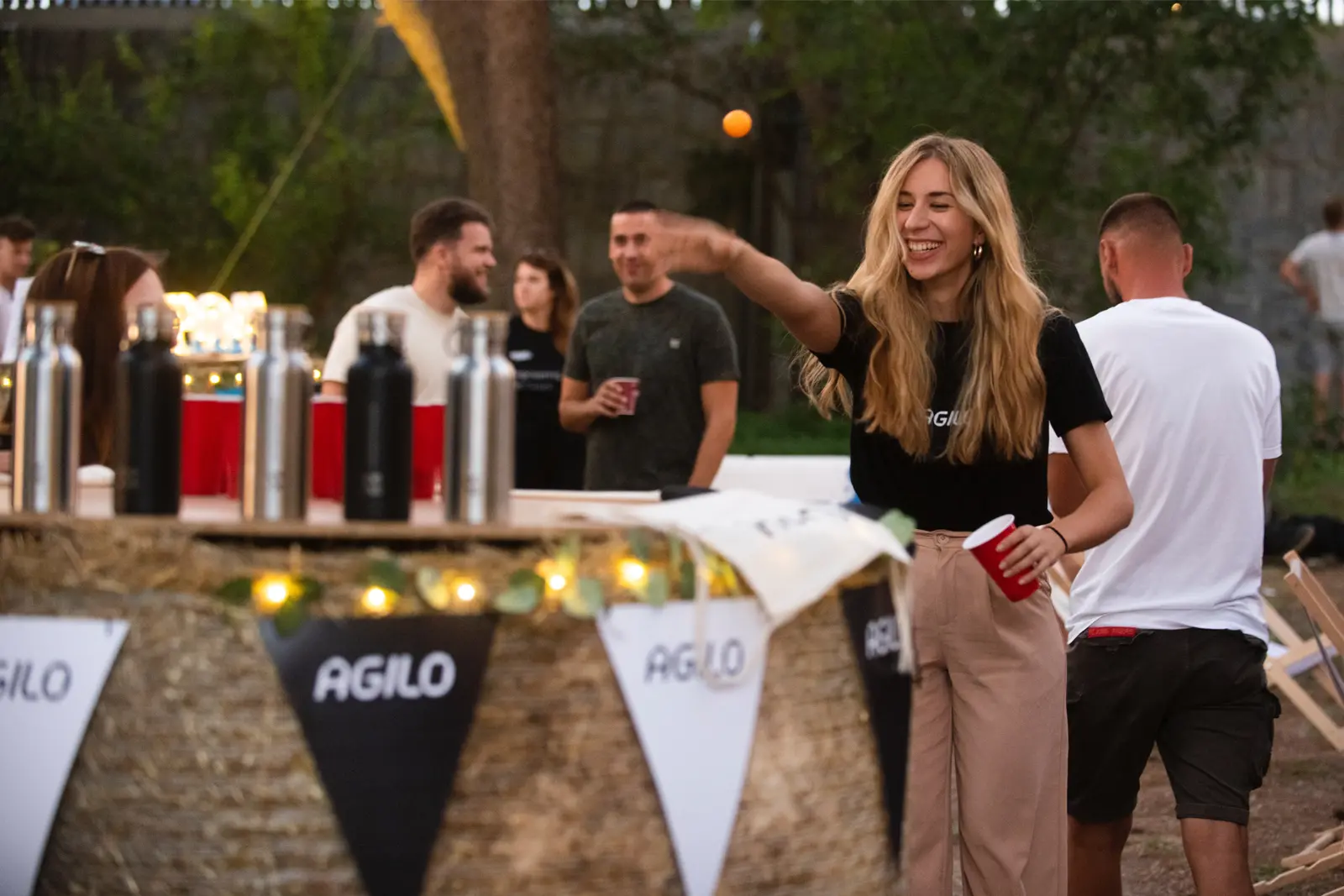 Martina playing beer pong